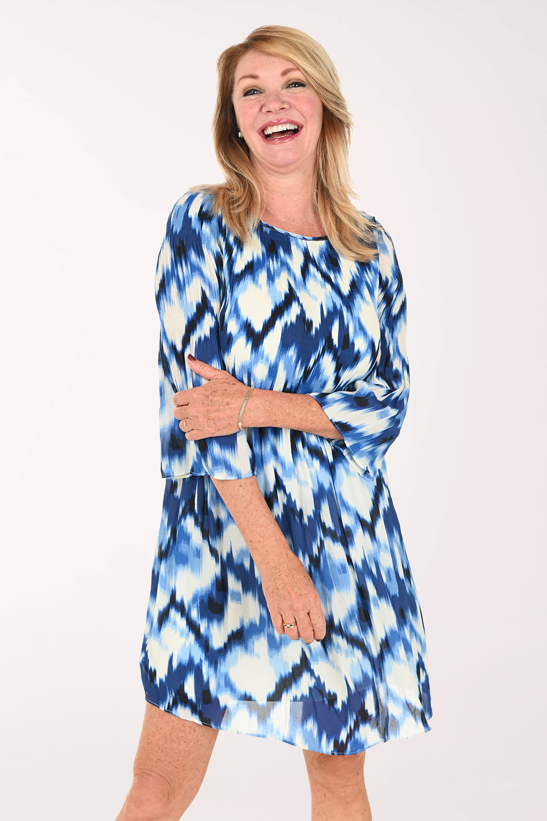 Woman wearing a multi blue dress