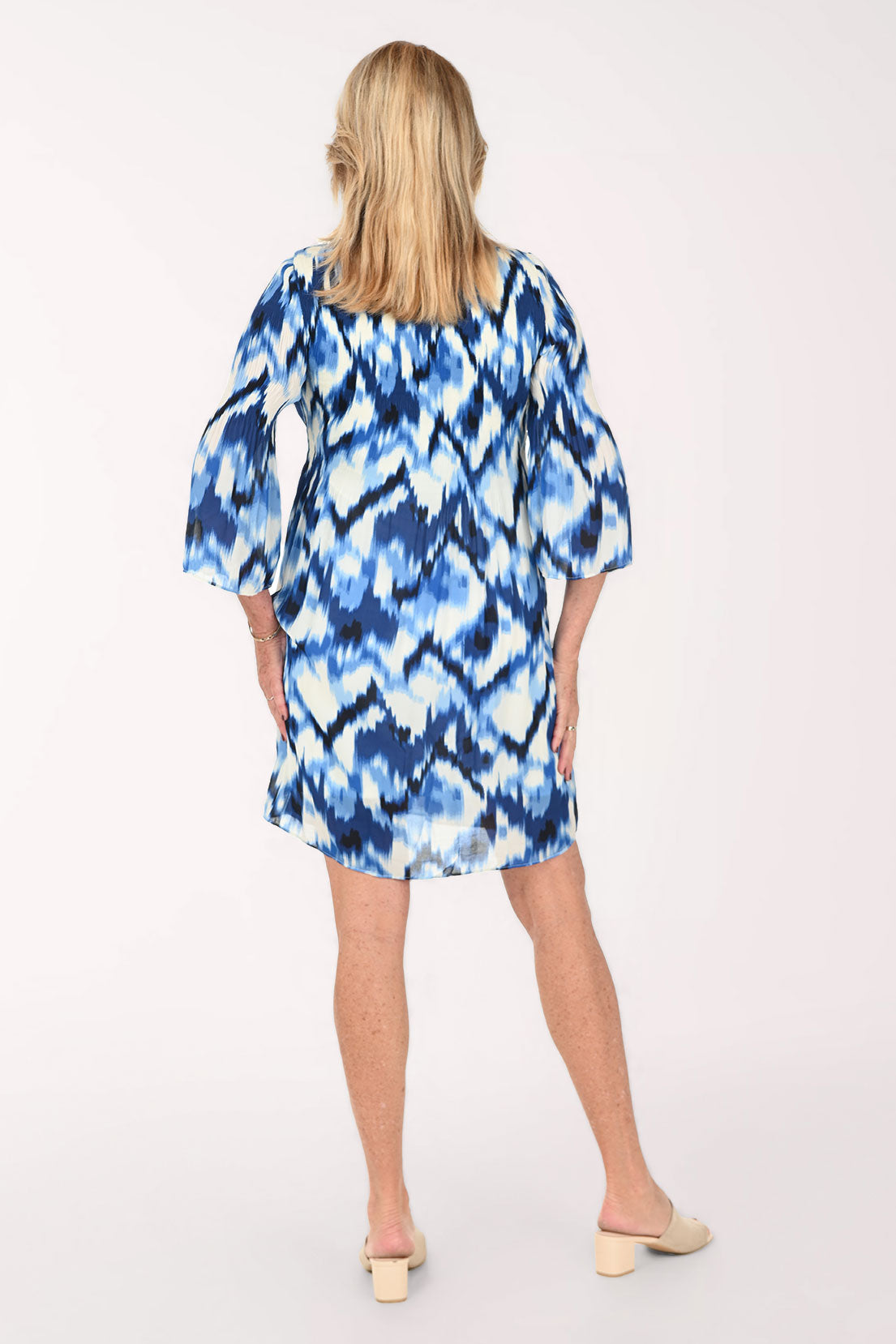 Woman wearing a multi blue dress