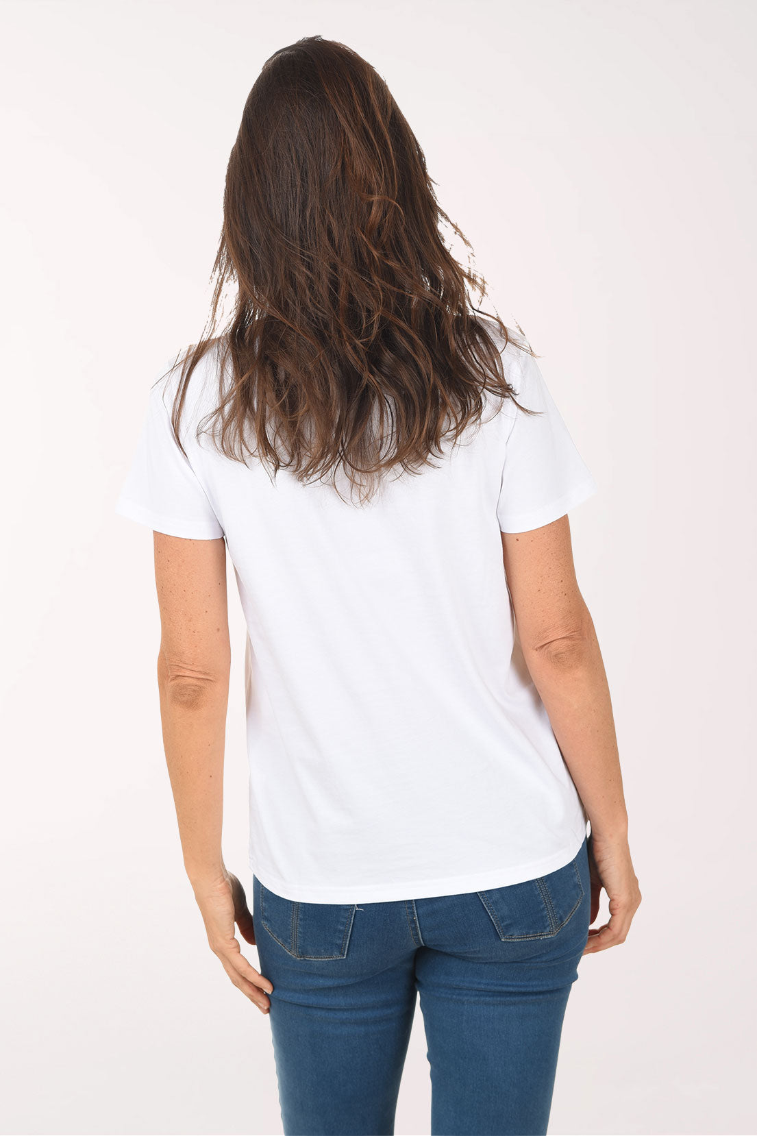 Woman wearing a white t-shirt with a bicycle graphic and 'Summer Vibes' text on a white background