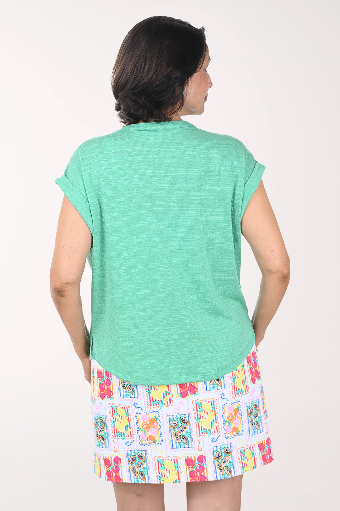 Woman wearing a green top