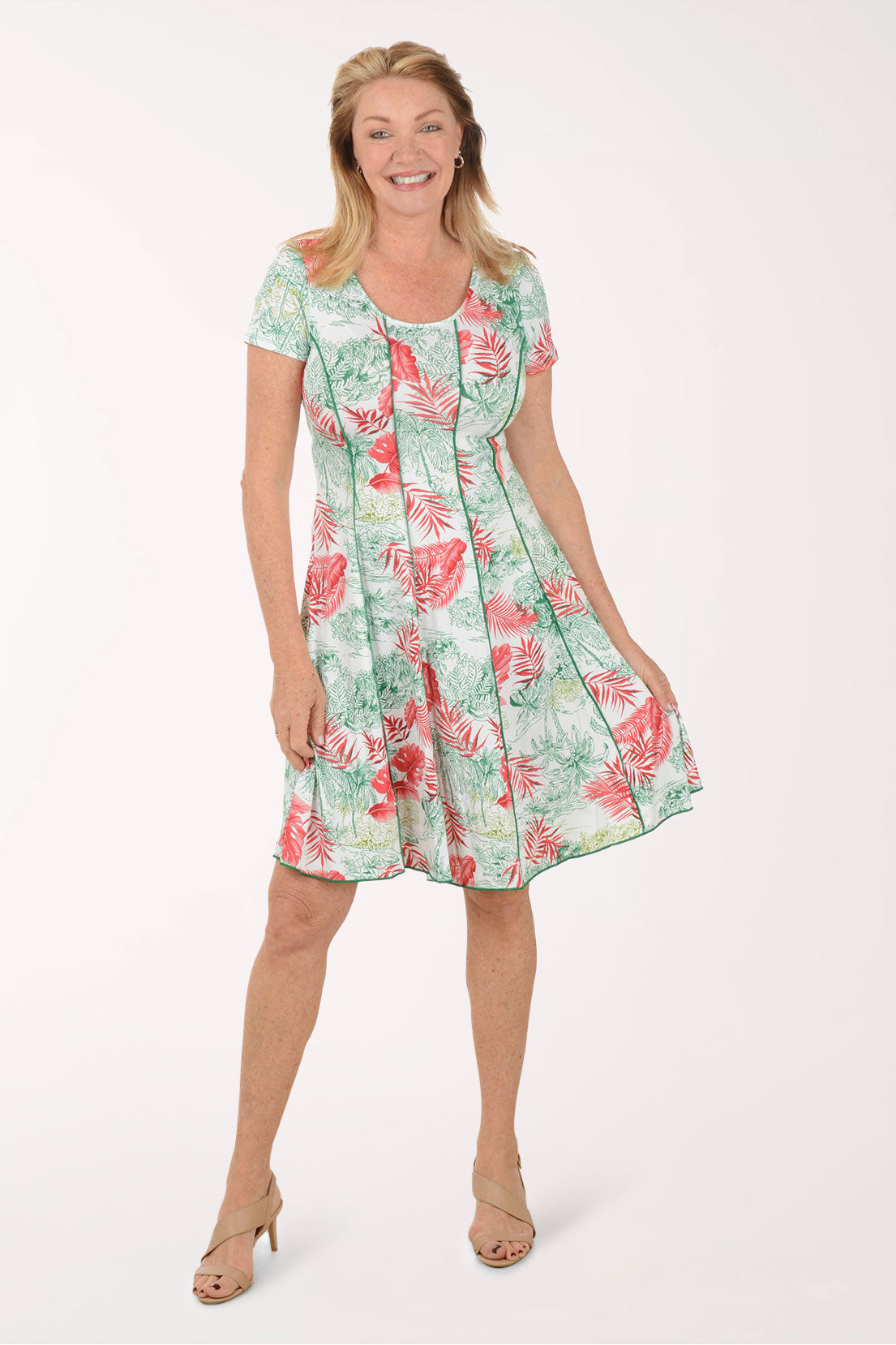 Woman wearing a floral dress on a white background