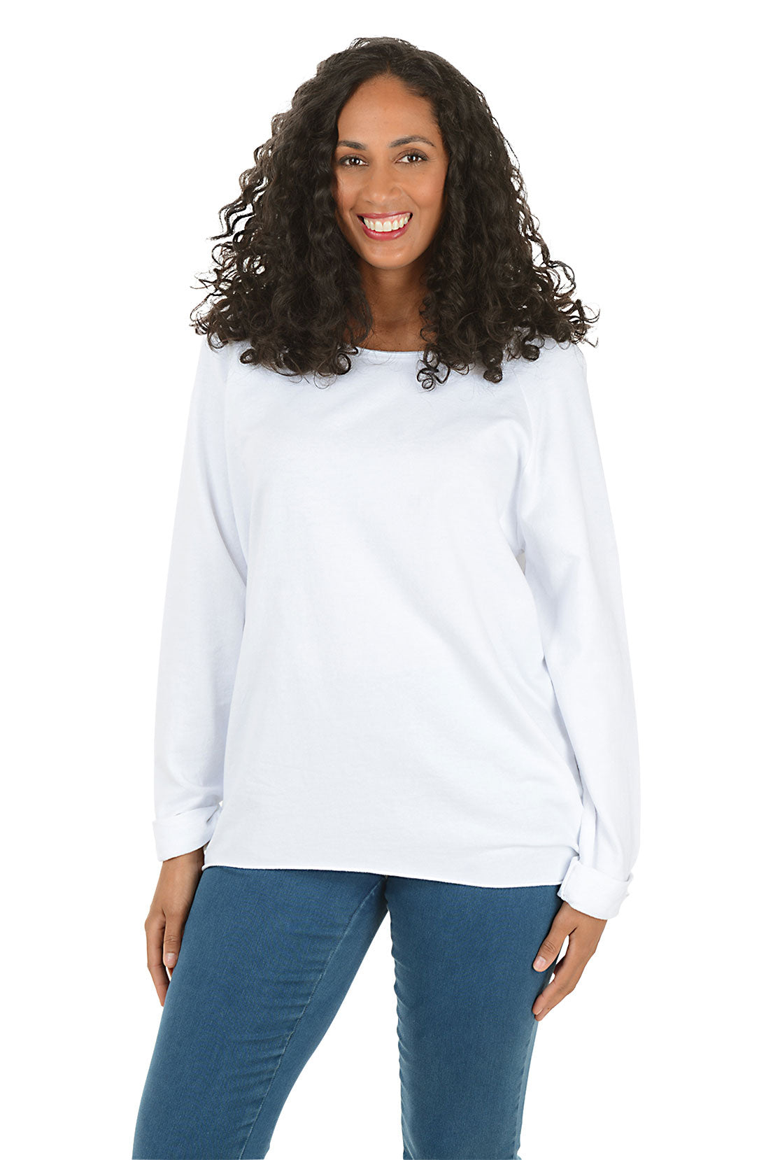 Woman wearing a white long-sleeve top and white pants on a white background.
