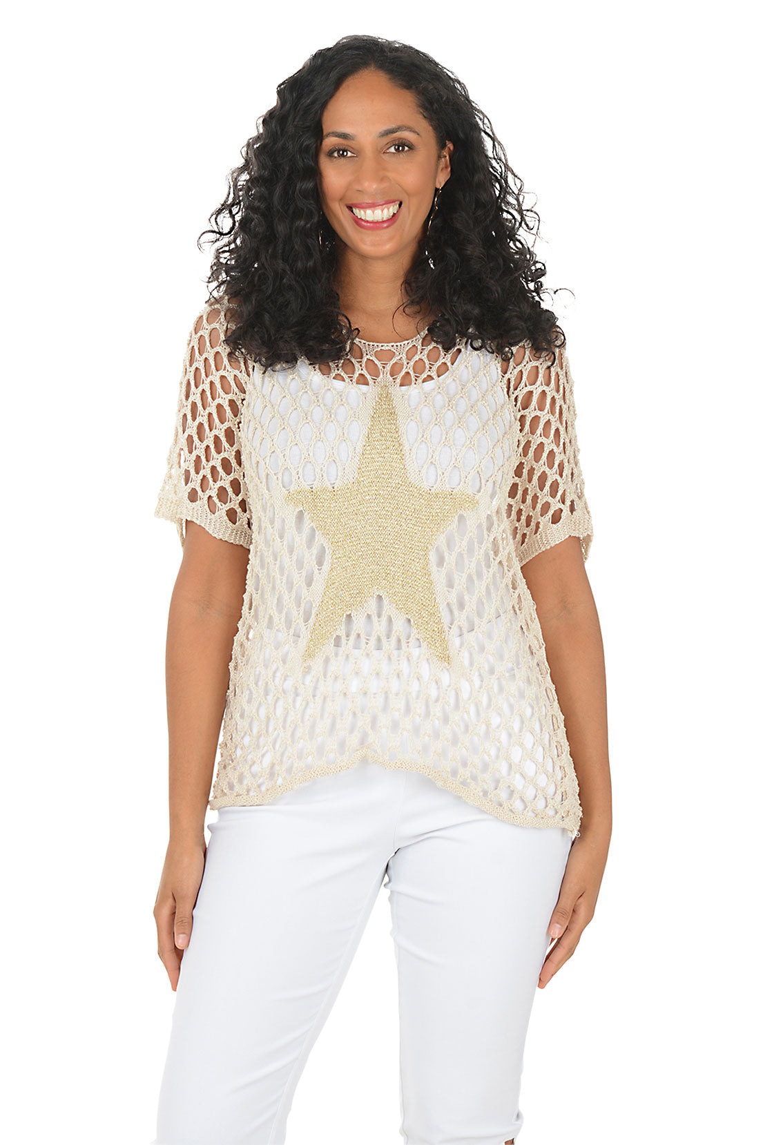Woman wearing a beige mesh top with a star design on a white background.