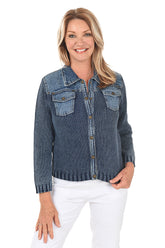 Woman wearing a blue denim sweater jacket on a white background.