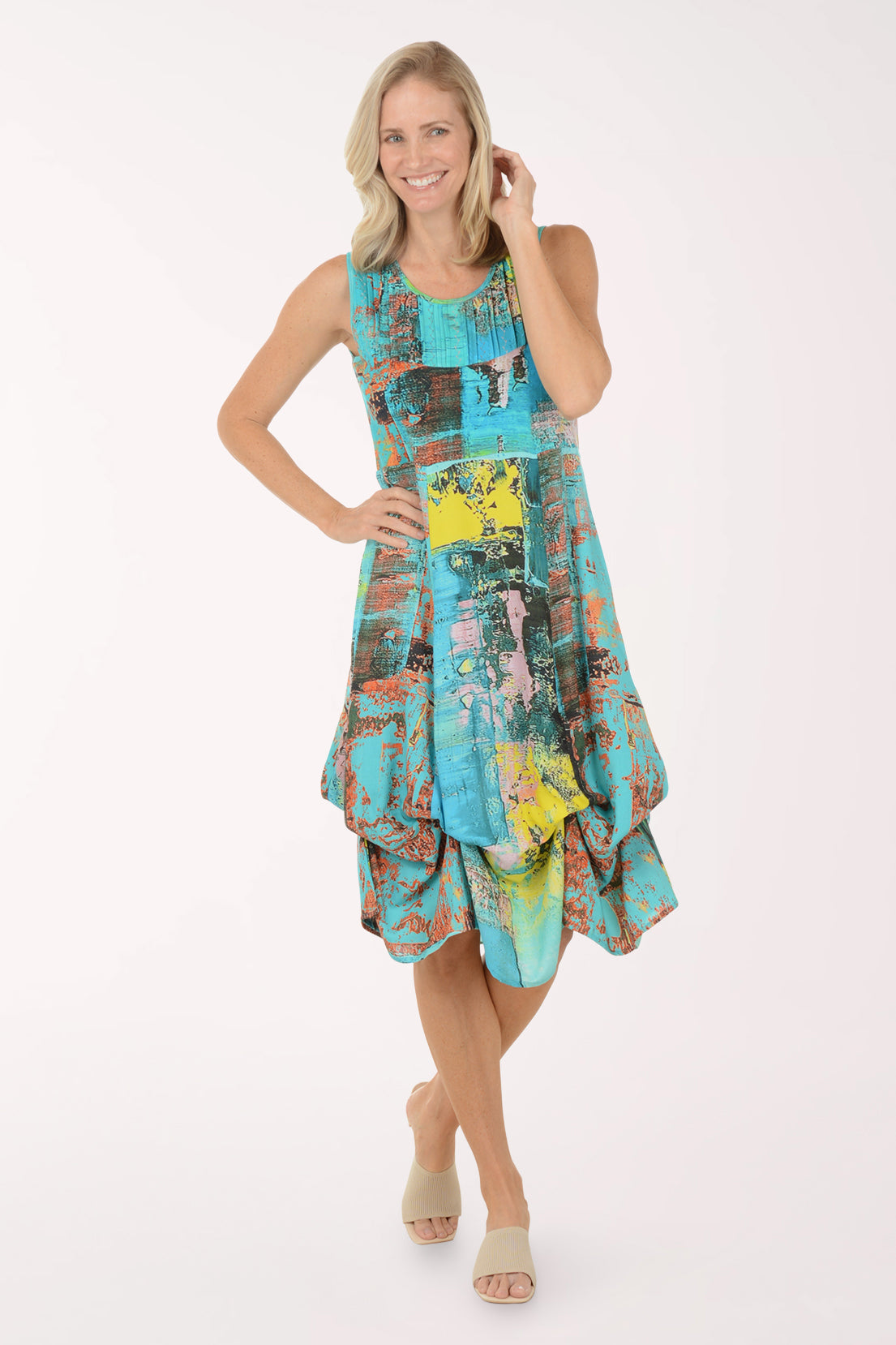 Woman wearing a colorful dress on a white background