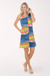 Woman wearing a colorful dress with a white background