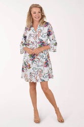 Woman wearing a floral dress on a white background