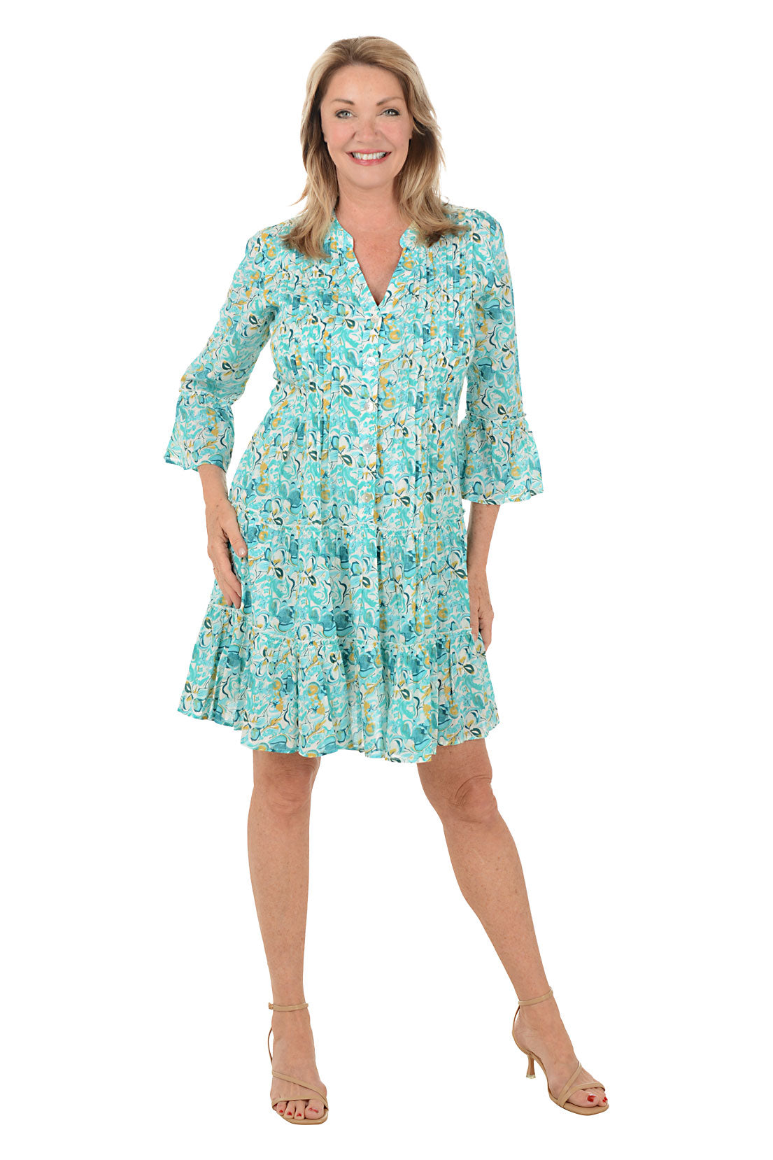 Woman wearing a floral dress on a white background