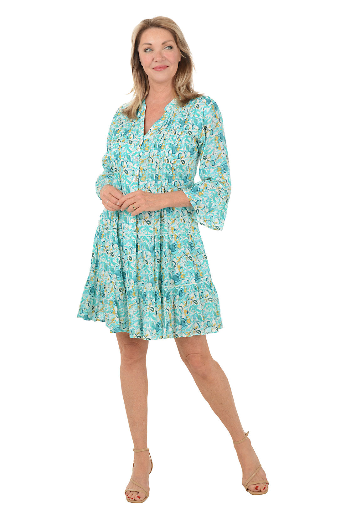 Woman wearing a floral dress on a white background