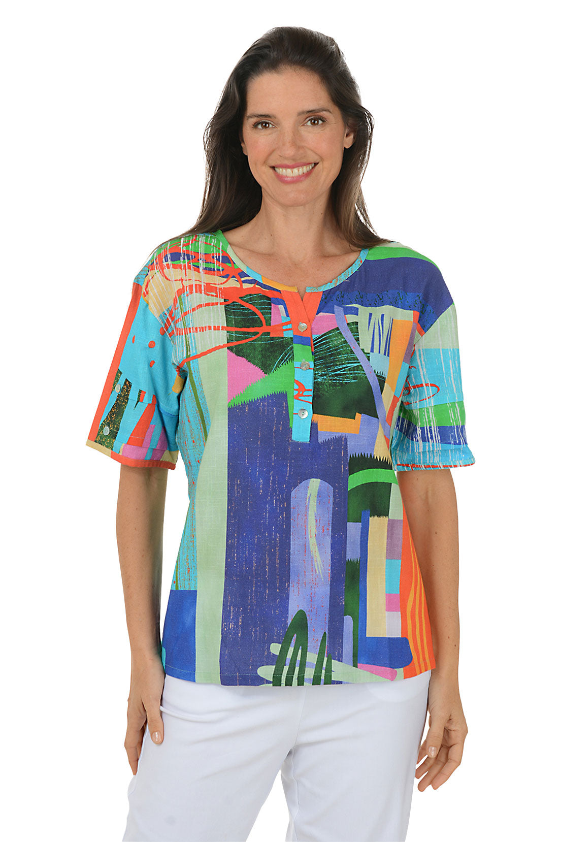Woman wearing a colorful abstract patterned top on a white background.