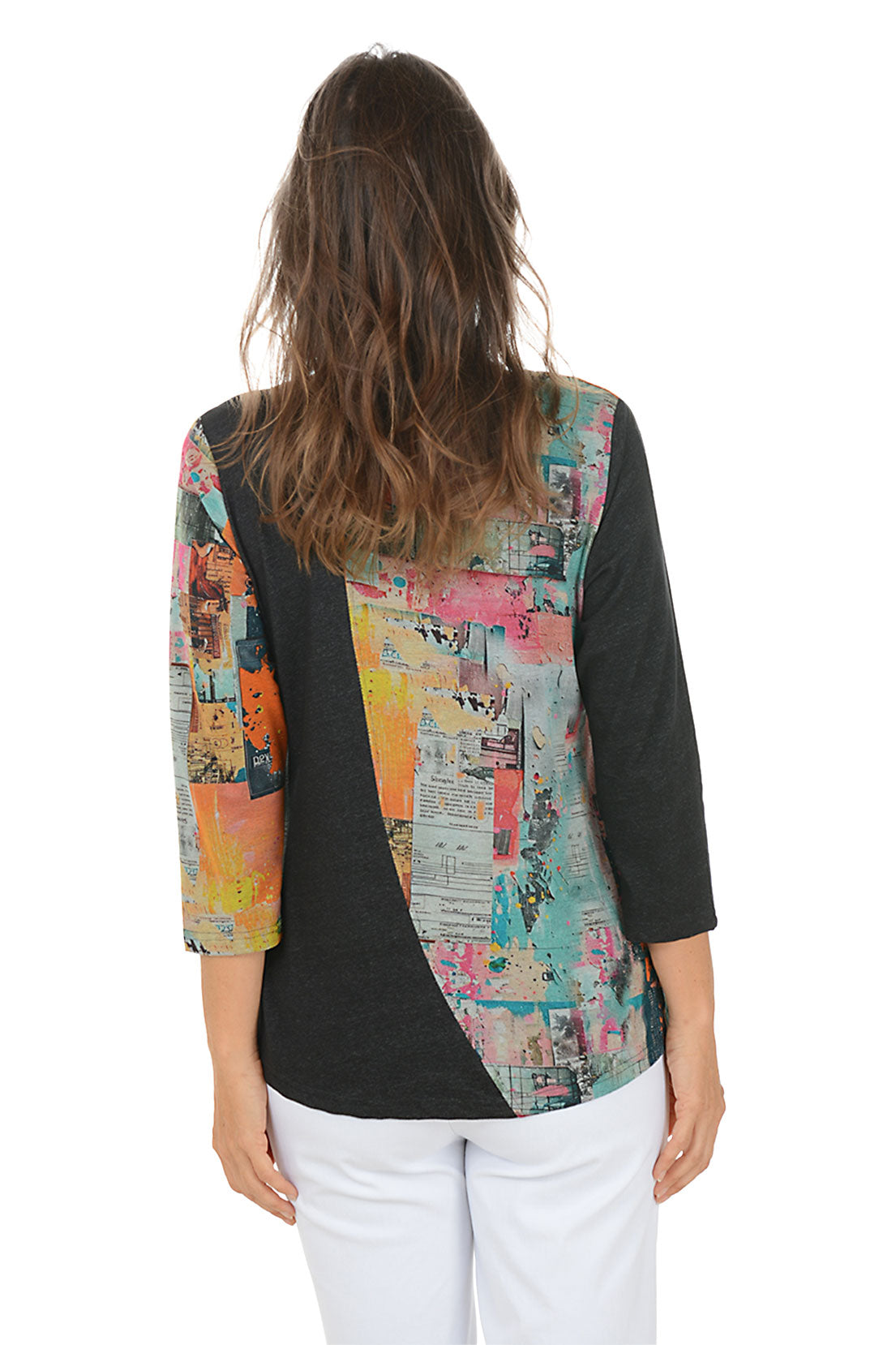 Woman wearing a black top with colorful patterned sleeves on a white background. Back shot.