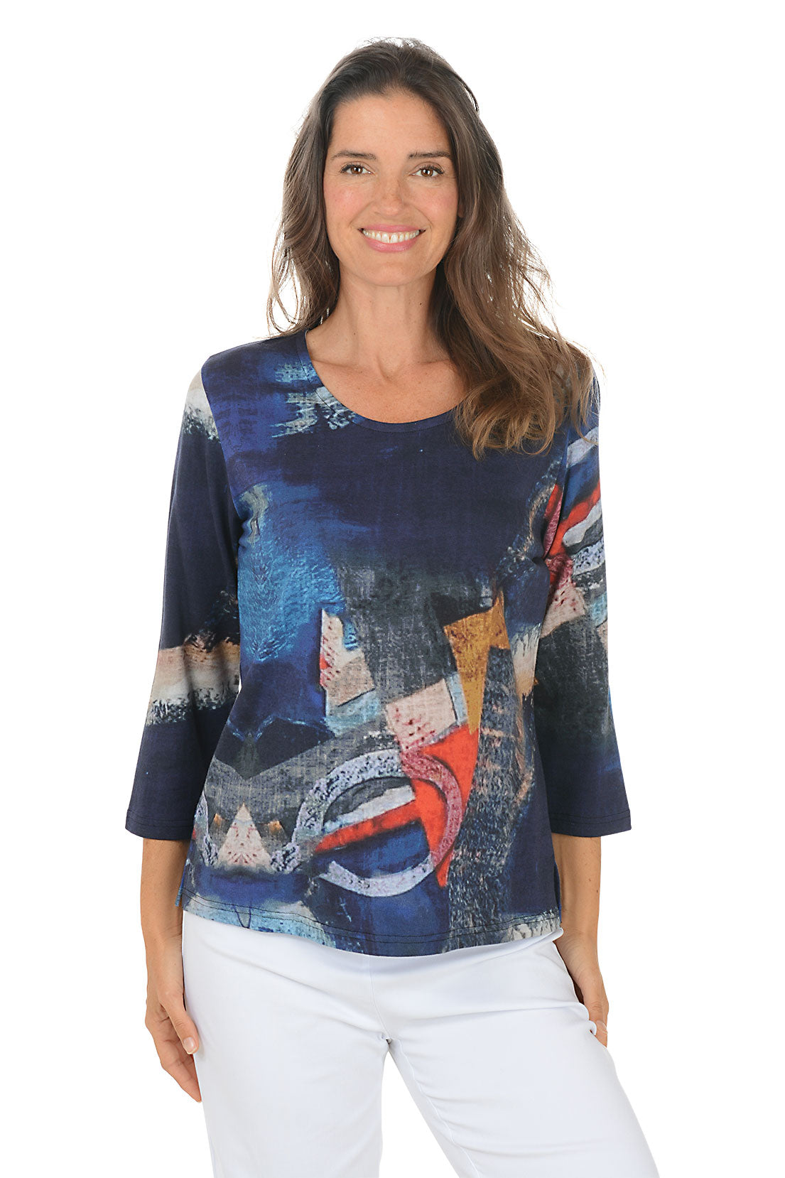 Woman wearing a 3/4 sleeve colorful abstract patterned top on a white background.