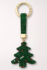 A green rhinestone Christmas tree bag charm with colorful rhinestone ornaments, on a green rhinestone strap with a gold ring.