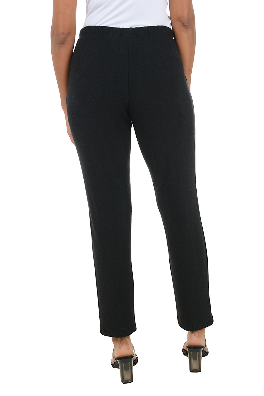 Black fleece lounge pants worn by a person on a white background. Back shot.