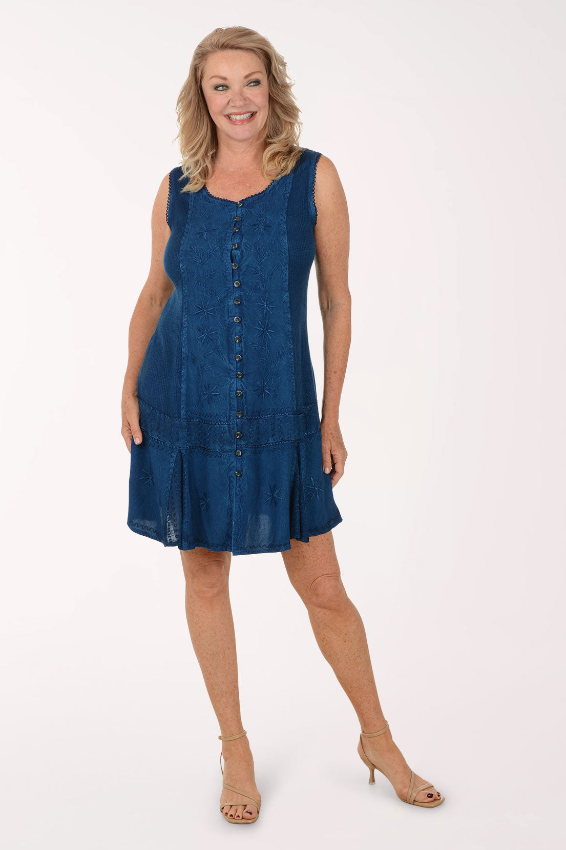 Woman wearing a blue dress on a white background