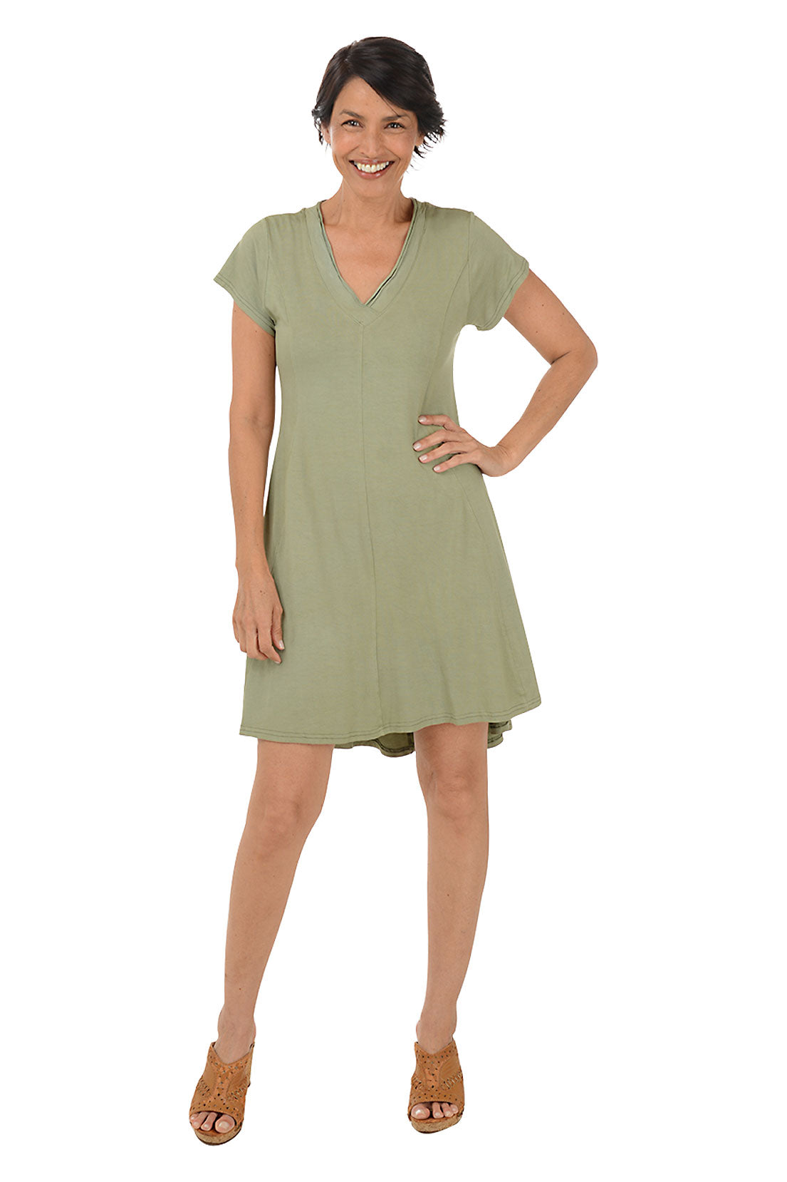 Woman wearing a solid short sleeve olive dress