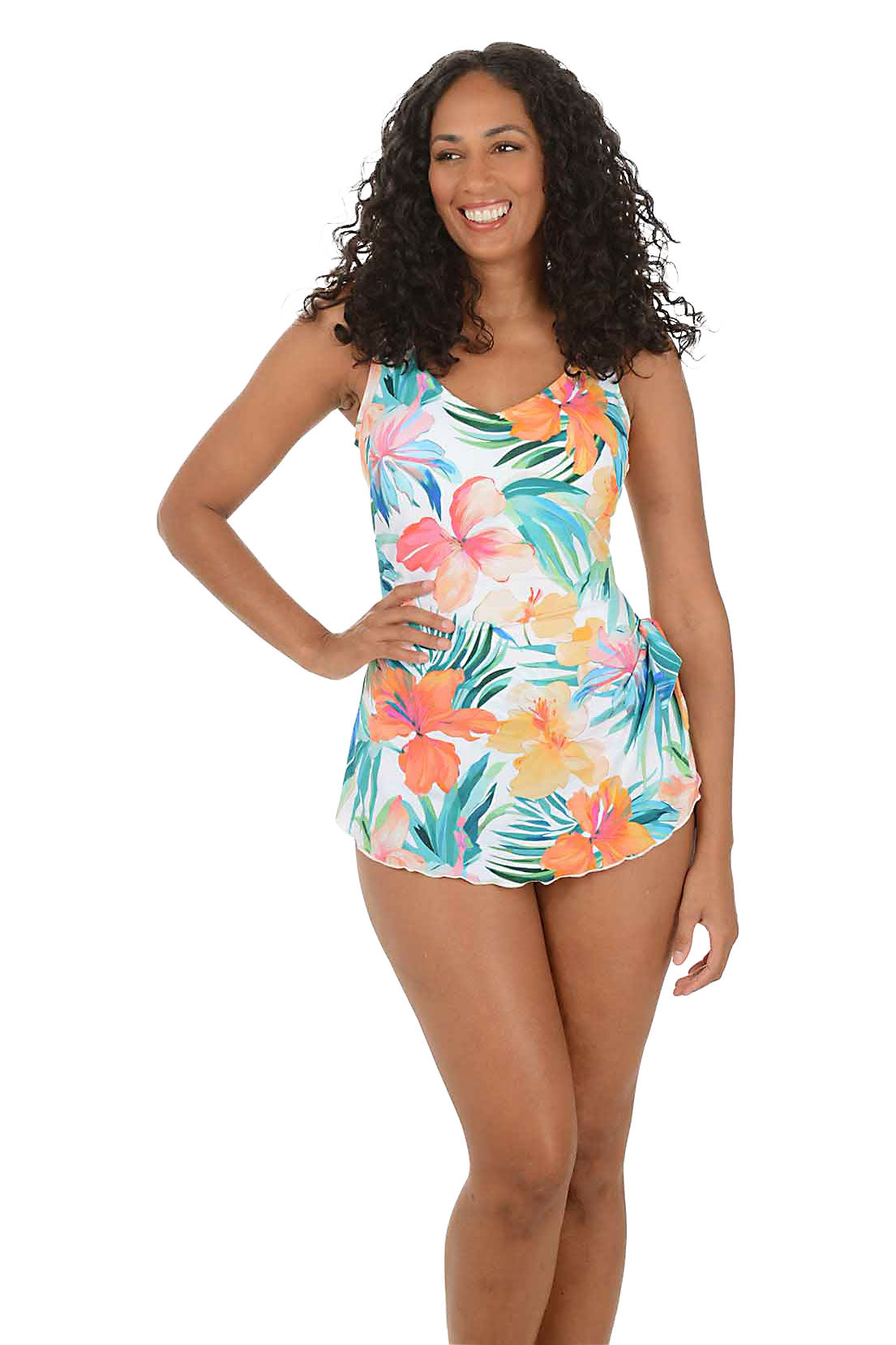 Woman wearing a colorful floral sarong swimsuit on a white background.