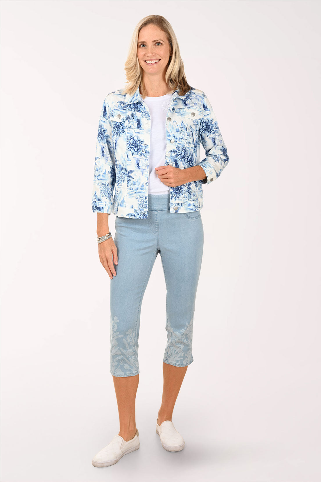 Woman wearing a cropped denim pant.