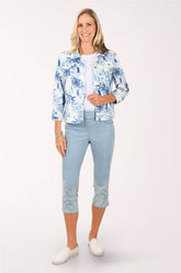 Woman wearing a cropped denim pant.
