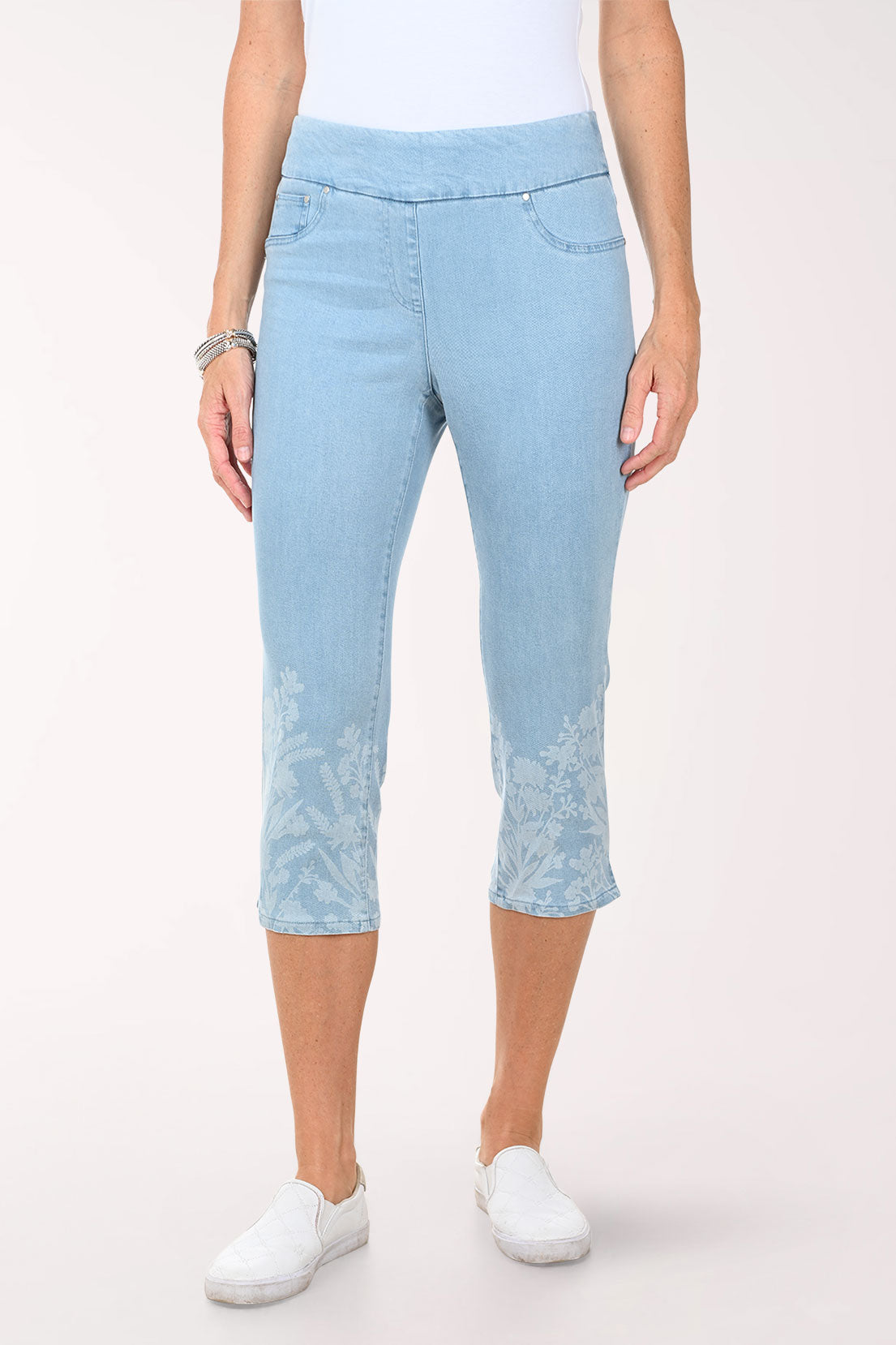 Woman wearing a cropped denim pant.