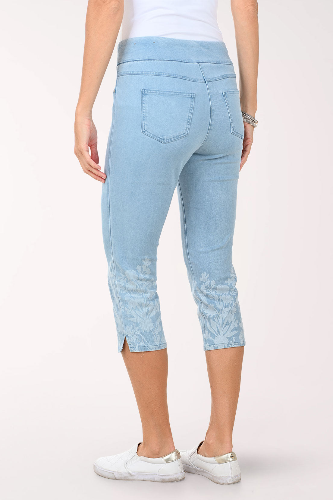 Woman wearing a cropped denim pant.