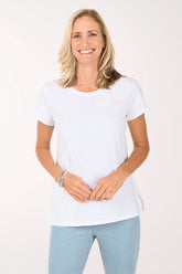 Woman wearing a short sleeve white top