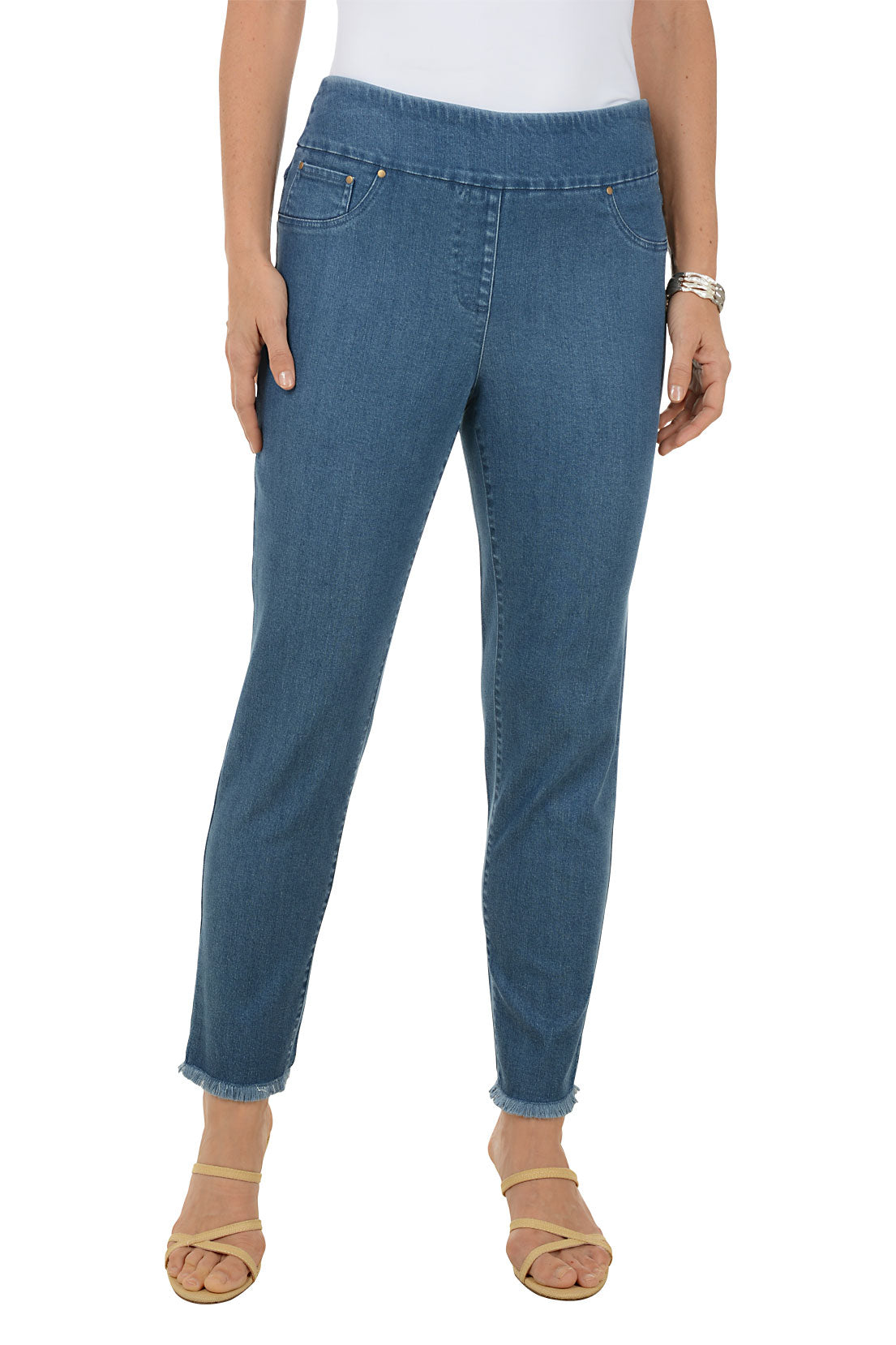 Person wearing blue jeans on a white background