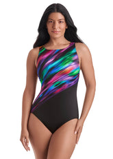 Woman wearing a colorful one-piece swimsuit with black base on a white background