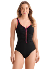 Woman wearing a black swimsuit with colorful zipper on a white background