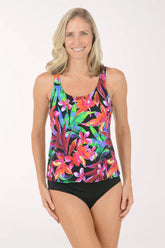 Woman wearing a multi floral tankini top.