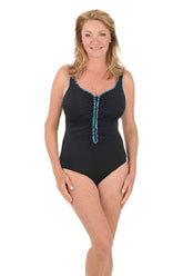 Woman wearing a black swimsuit with a turquoise piping on a white background.