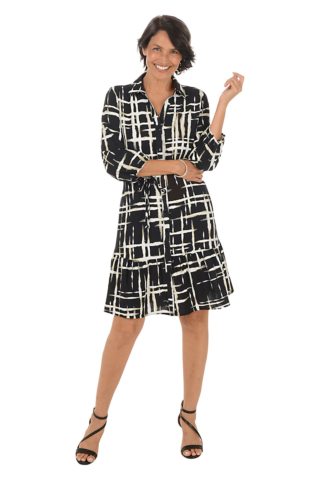 Woman wearing a zebra print dress on a white background.