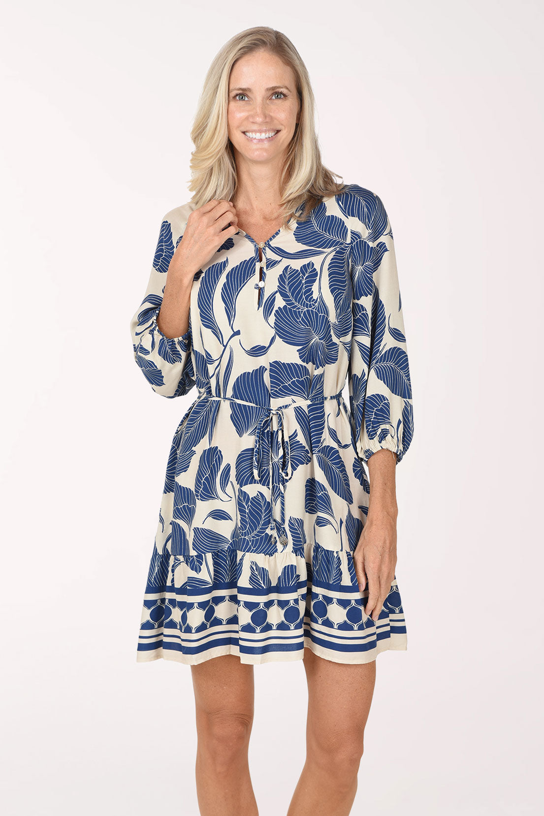 Front view of the Trumpet Flower Belted Dress with the tie belt