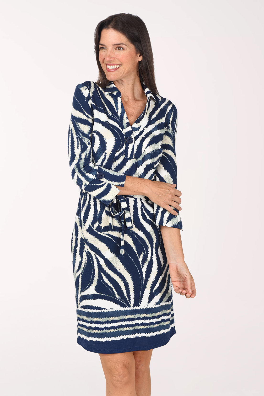 Close-up of the fold-over collar and buttoned V-neck on the Blue Swirl Belted Dress