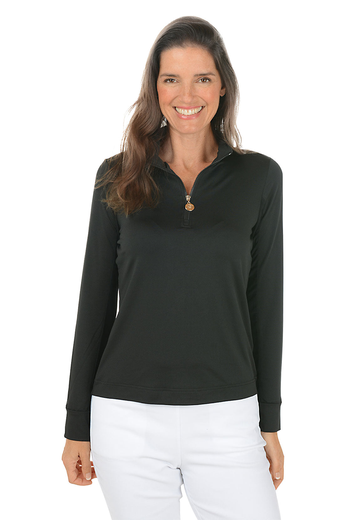 Woman wearing a black long-sleeve top and white pants on a white background. Second front shot.