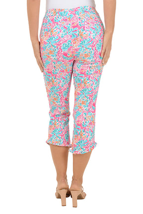 Colorful patterned pants worn by a person on a white background. Back shot.