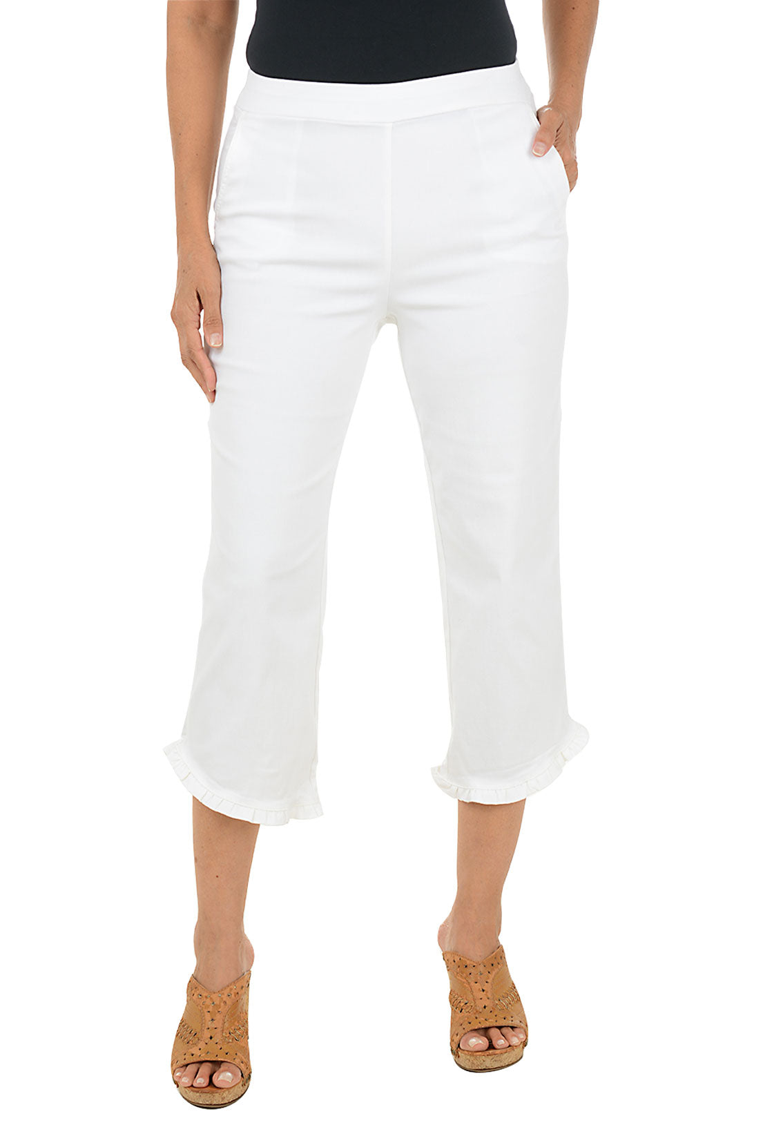 Person wearing white capri pants on a white background