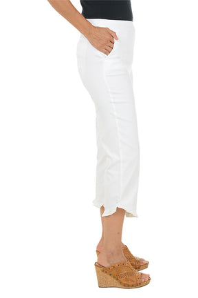 White pants worn by a person on a white background. Side shot.