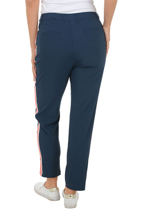 Navy pants worn by a person on a white background. Back shot.