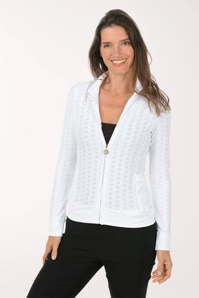 Woman wearing a white lace jacket over black pants on a white background