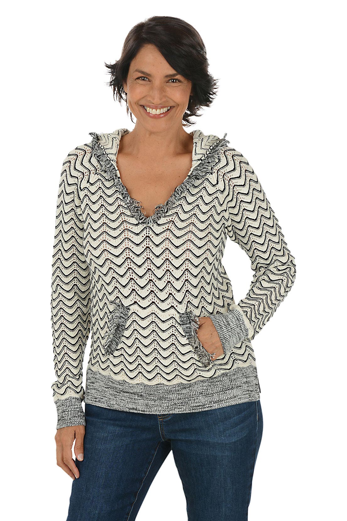 Woman wearing a zigzag patterned hoodie on a white background.