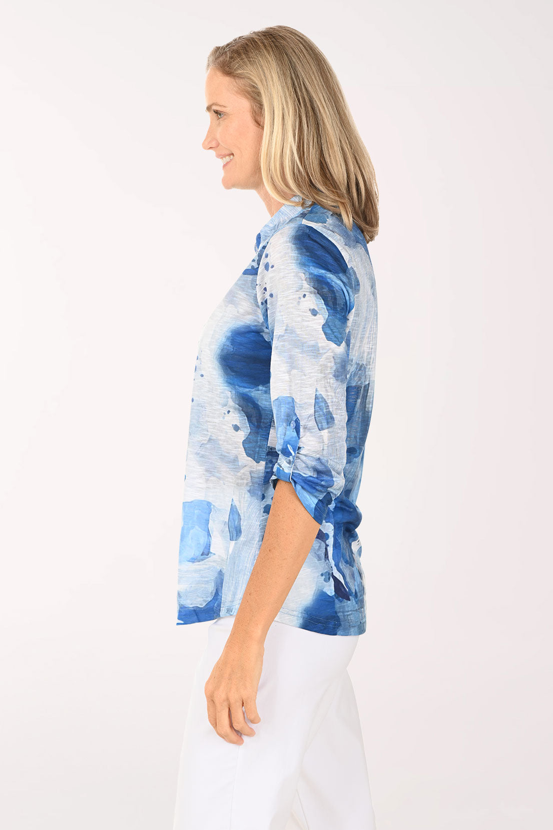 Woman wearing a blue button down shirt