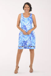 Woman wearing a floral dress on a white background