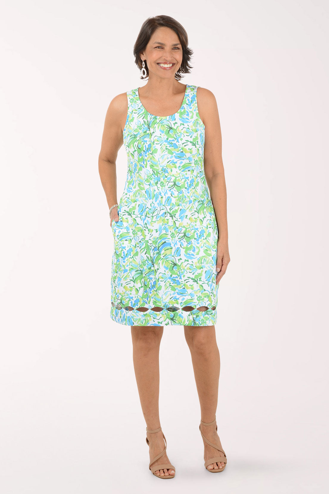 Woman wearing a floral dress on a white background