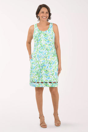 Woman wearing a floral dress on a white background