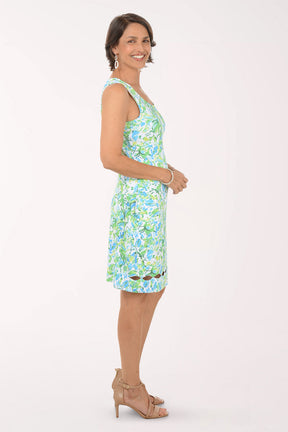 Woman wearing a floral dress on a white background