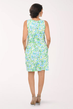 Woman wearing a floral dress on a white background