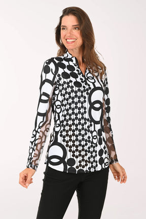 Woman wearing a black and white long sleeve quarter zip-up top
