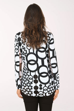 Woman wearing a black and white long sleeve quarter zip-up top