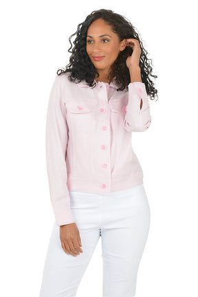 Woman wearing a light pink button-up shirt and white pants on a white background